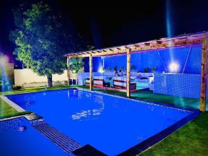 PARA PASSAGEM DO FINAL DO ANO
 MORADIA T-4, 2 SUÍTES, PISCINA,  BAIRRO DE AGOSTINHO NETO Á 2 MIN D