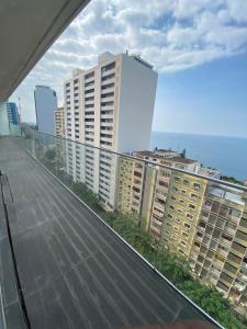 Vende-se flat T3 suite com piscian em predio novo - PLATINUM
